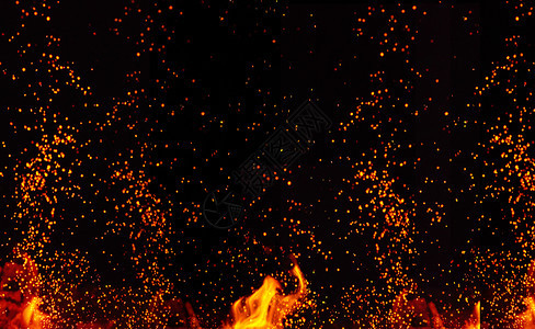 用火焰和橙色的花燃烧大营火柴和橙色花向不同方飞来背景图片