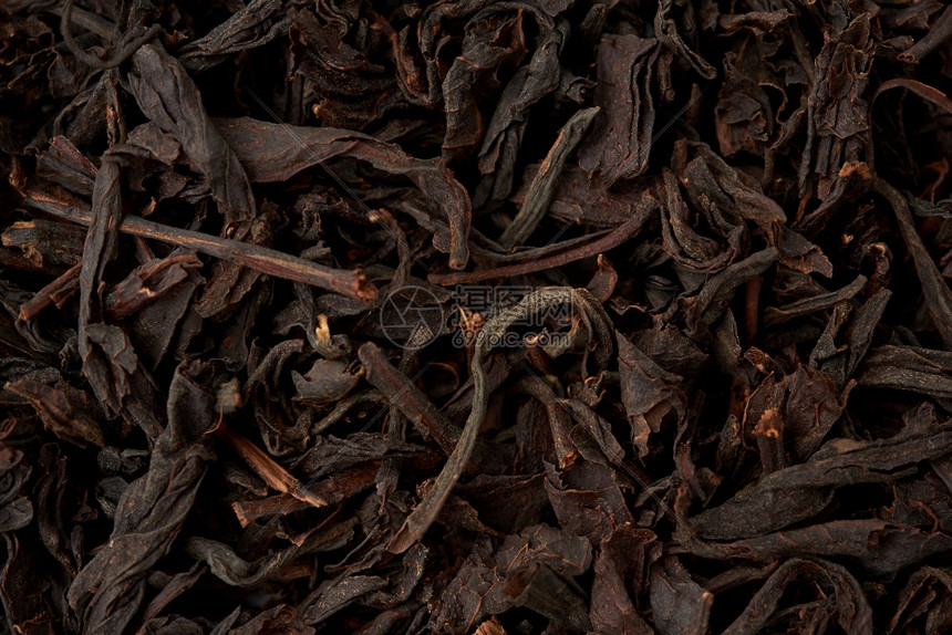 干黑色长叶茶的纹理顶视图热饮的成分关上高清图片下载-正版图片30710