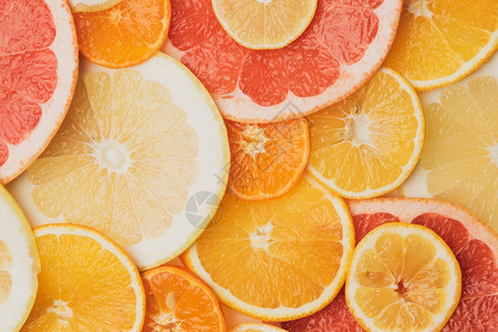 柑橘果切成圆形橙葡萄果柠檬橘子柑和多汁水果顶层风景柑橘水果切成圆形橙橘子图片