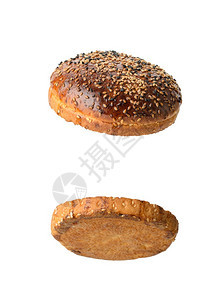 棕色芝麻种子面包两半烤快餐图片
