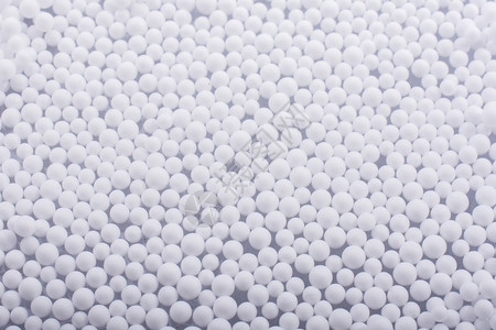 白色微聚苯乙烯泡沫球作为背景背景图片