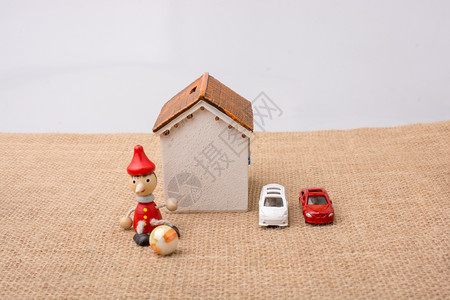 有汽车和皮诺曹的小模特房背景图片