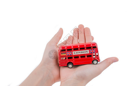手持白色背景的伦敦公交车图片