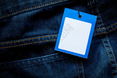 带空白标签的蓝色牛仔裤细节背景图片