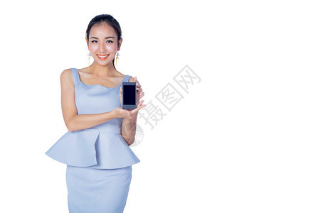 年轻女商人笑容的展示了在白色背景上与世隔绝的移动模特是个亚洲美人图片