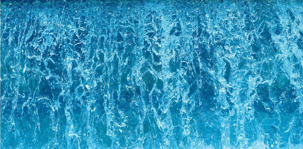蓝色水流喷洒可用作背景背景图片