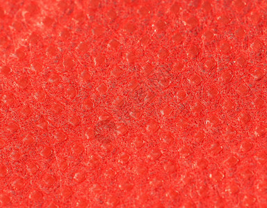 红非编织聚丙烯物纹理作为背景有用红非编织聚丙烯物纹理背景图片
