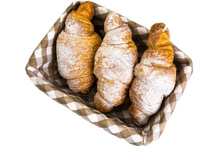 面包篮中美味的脆饼羊角面包工作室照片面包篮中美味的脆饼羊角面包图片