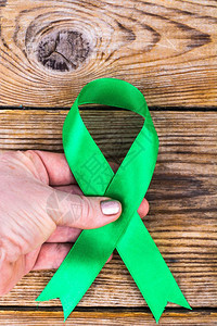 绿丝带作为该疾病认识的象征世界卫生日工作室照片图片