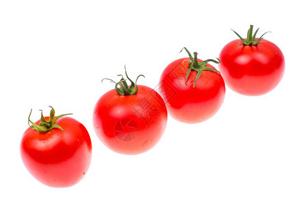 几个红熟的西柿在白色背景上被孤立图片