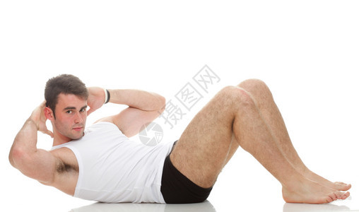 感年轻时装运动员健身肌肉模特男做推运动白背景图片