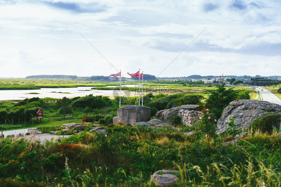 旅游州路4号Jaeren公路挪威瑟伦沿海景观有挪威在风上挥舞南挪威海岸线公路Jaeren图片