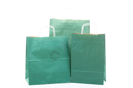 白色背景孤立的购物绿色礼品袋图片
