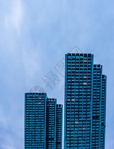 玻璃高升楼摩天大的蓝色背景商业现代化的未来商业城市成功的工业建筑商概念背景图片