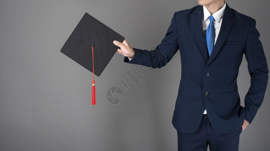 商人持有毕业帽子图片