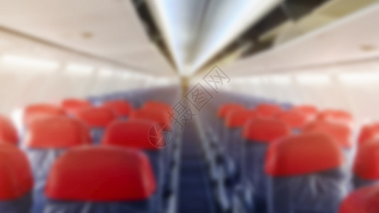 机上飞座椅的模糊背景旅行和运输概念机上飞座的模糊背景图片
