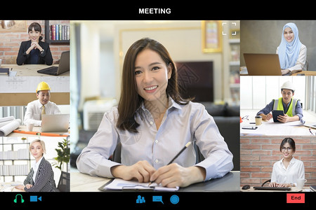 年轻亚洲女商人的画面在网上使用视频会议与来自她家的伙伴或商业同事举行年轻亚洲女商人的图片画面在网上使用视频会议与来自她家的伙伴或图片