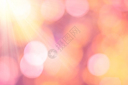 Bokeh背景粉红色橙的阳光用作情人节或爱期图片