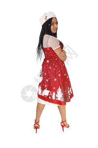 一位年轻可爱的女士穿着裙子背穿红色高跟鞋仰着肩膀与白种背景隔绝背景图片