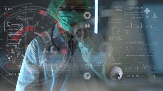 医疗技术概念智能医生用现代计算机在医院用虚拟图示在医院办公室工作图片