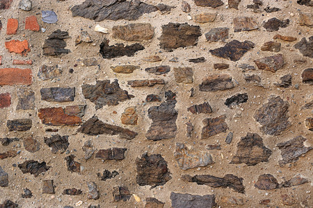 古老的墙有石块和砖紧闭的纹理图片