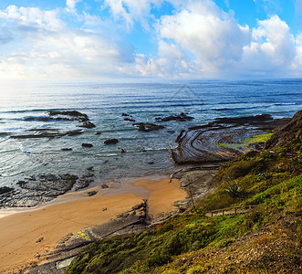 在低潮下葡萄牙阿尔杰苏加韦在低潮下阿尔杰苏加韦在水下海滩上设置自然两栖剧院石化曲线图片