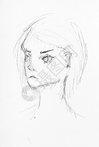 白纸上黑铅笔亲手绘制的脸庞图片