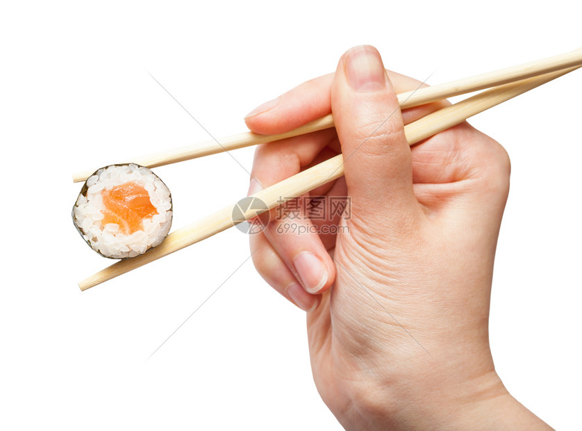 女用一次筷子手握着白底鲑鱼和图片