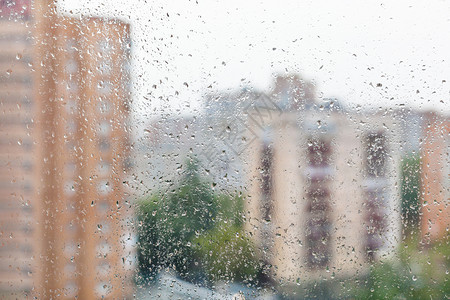 雨秋天背景的模糊城市风背景图片