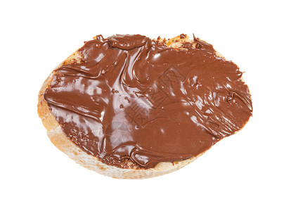 白背景上隔绝的新鲜面包和巧克力开放三明治的顶部视图图片