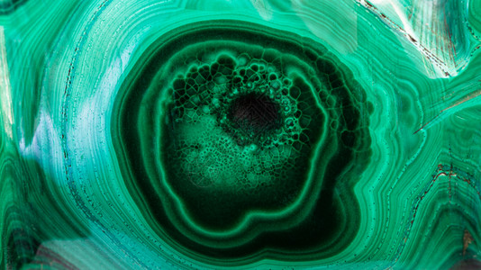 光滑的天然马拉奇特岩的绿色背景自然马拉奇特的绿色背景图片