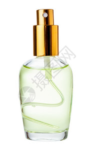 在玻璃瓶上喷上隔离在白色背景上的香水在玻璃瓶上喷上隔离在白色表面的香水图片