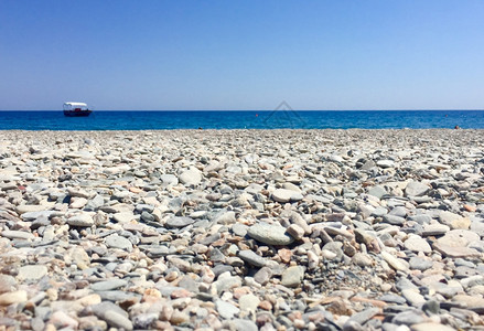沙滩上的额石子背景图片