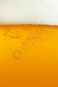 摄影布酒精轻啤背景宏观摄影近距离视图中的啤酒橙喝设计图片
