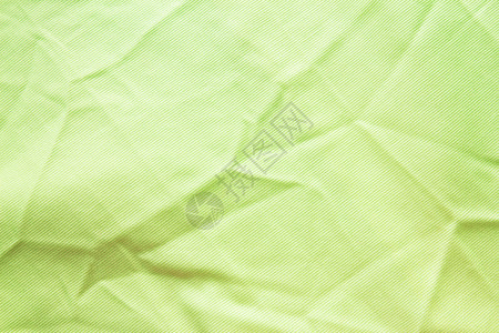 粗质和背景绿色皱纹织物衣服折叠缝纫图片