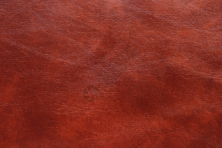 红褐色faux皮革的背景和纹理红棕色的质地图片