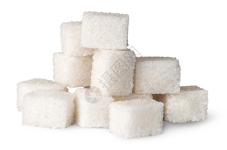 在白色背景上隔离的白糖立方体桩水晶块图片