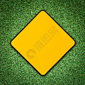 质地象征绿草上黄色符号的背景警告背景图片