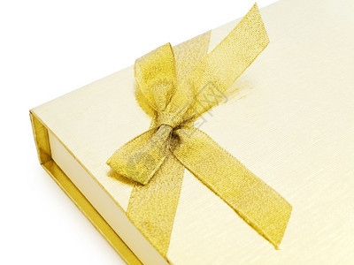 黄金礼品盒有弓过白背景的黄金礼品盒物闪耀生日图片