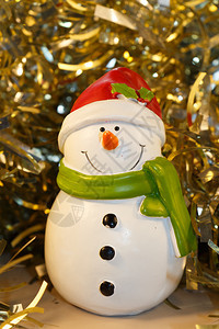 箔为了雪人雕像和金锡子作为圣诞节的装饰品派对图片