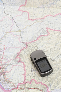 踪迹全球的GPS和用于规划远足旅行的GPS和罗盘背景图片