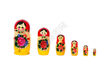 堆叠Matryoshka俄罗斯娃排成一在白色上隔离玩具娃嵌套图片
