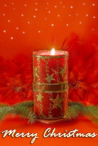 邮政金的子圣诞装饰红蜡烛脱树枝和红羽毛图片