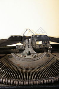 打字机的用意是印纸上的任何文字秘书故意的黑色背景图片