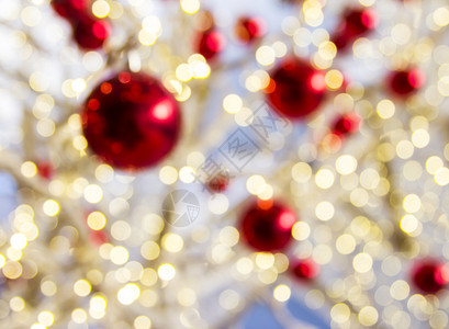 明亮的庆典金子圣诞节灯光背景模糊的抽象图片