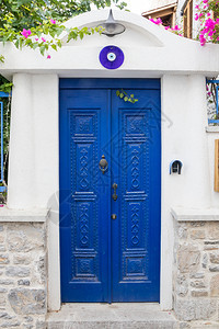 蓝色的土耳其博德鲁姆一座房屋的蓝色门和入口家邪恶的图片