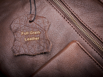 皮带标签有全谷类皮带文字塞在金子中粮食包皮革图片