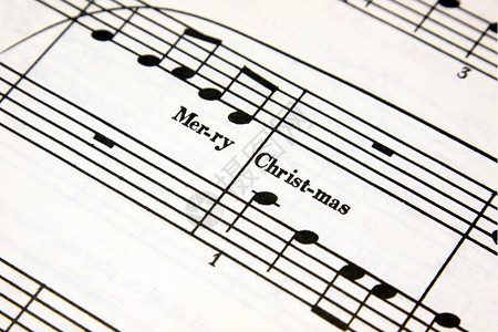 笔记字季节圣诞快乐的短信在一张音乐单上圣诞图片