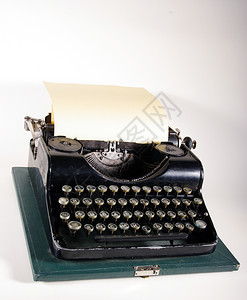 故事打字机的用意是印纸上的任何文字键盘嘈杂背景图片