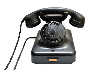 白色背景上隔绝的旧黑色电话拨号超过经典的图片